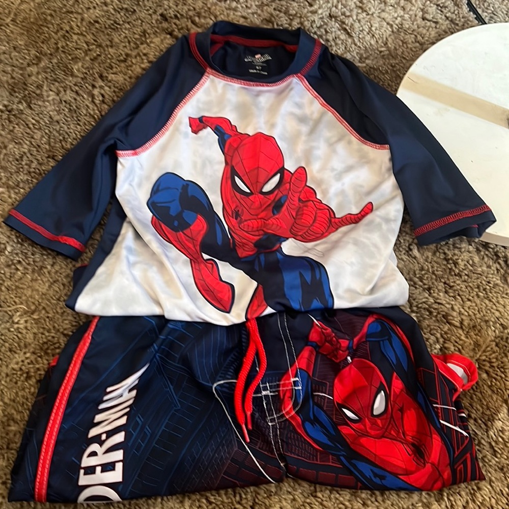 Spider-Man swim trunks and swim shirt.